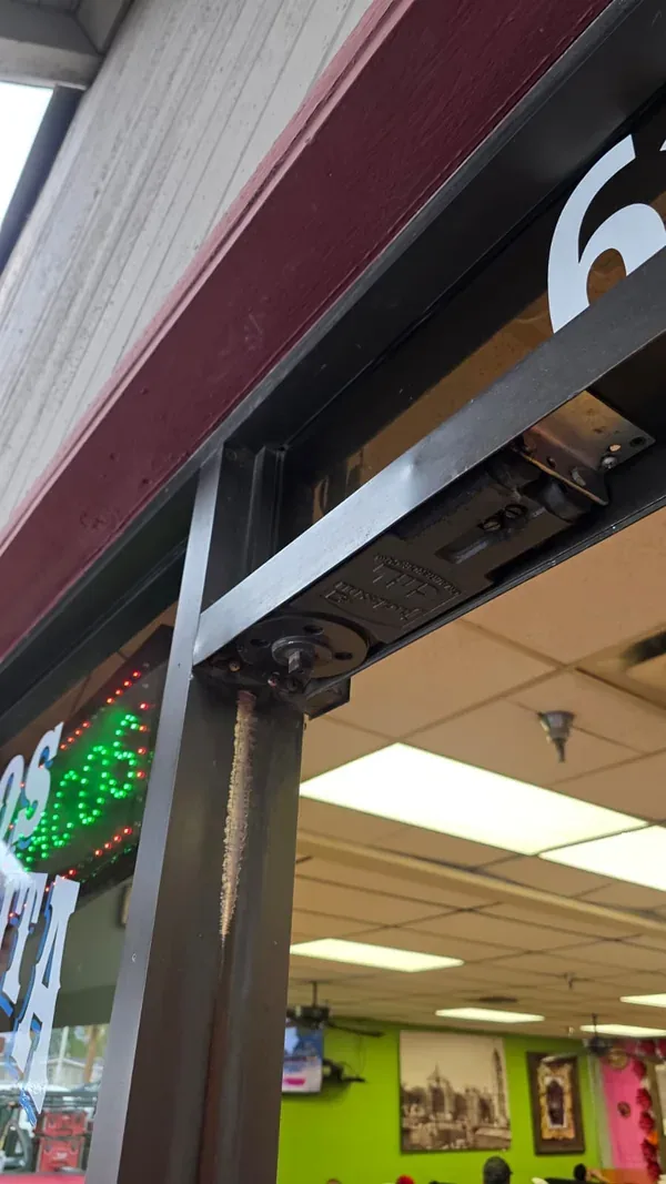 Commercial door header and concealed closer area