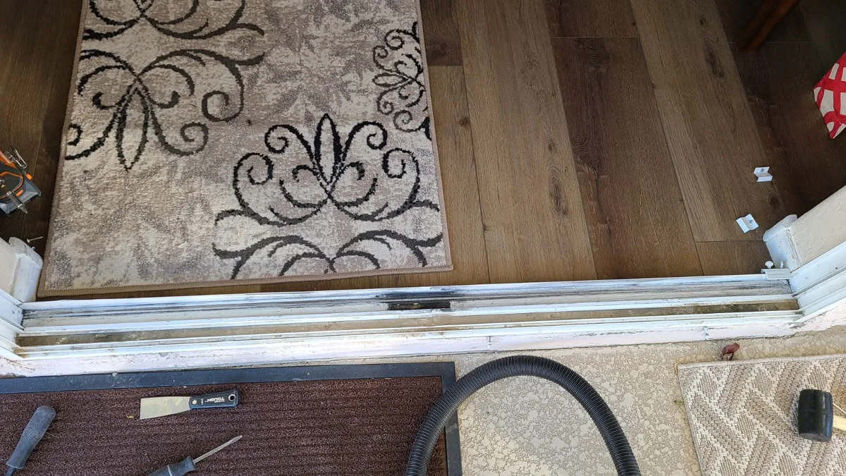 Same patio door threshold with a fitted metal track cap